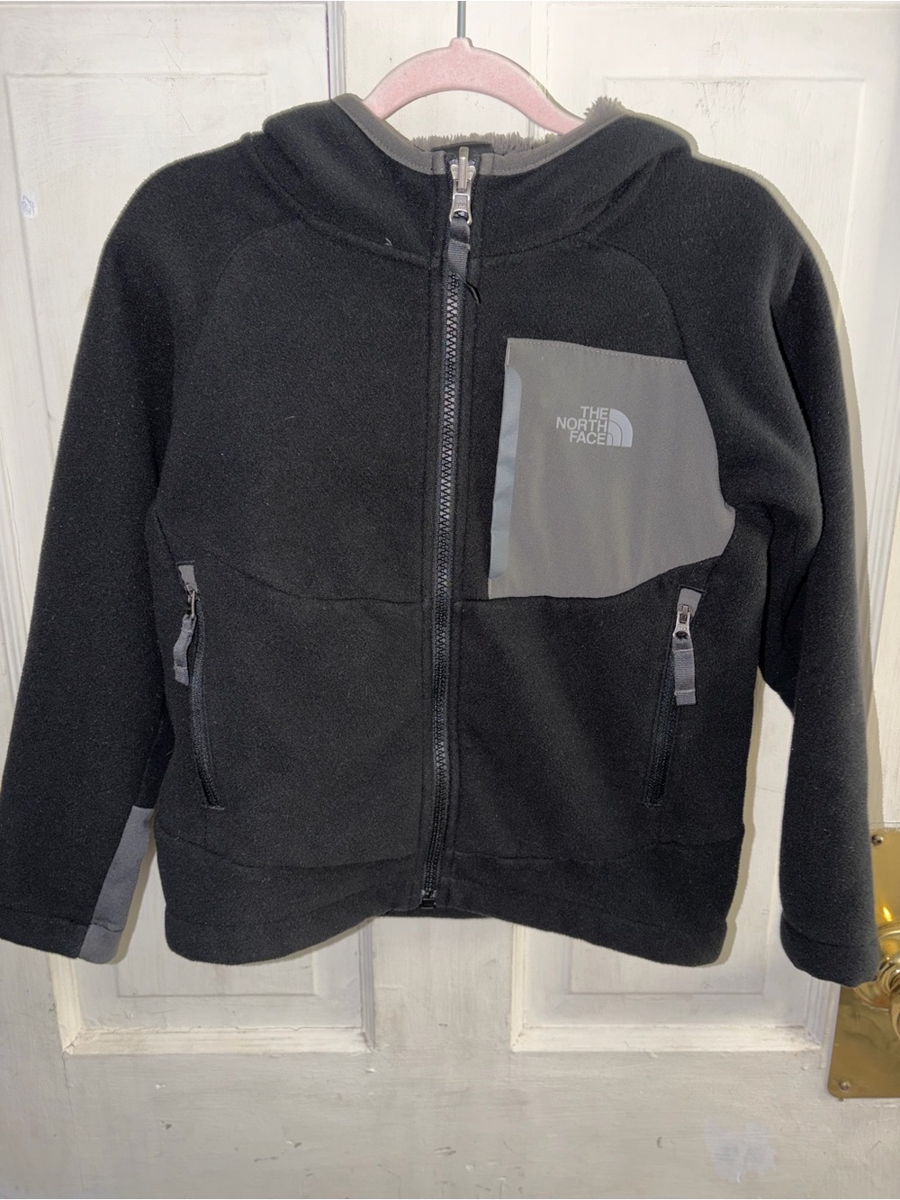 The North Face Kids Black Hooded Fleece Jacket with Gray Chest Panel